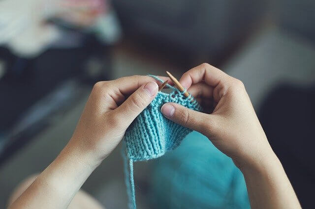Knitting a blue sweater